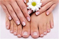 Woman's feet and hands being pampered at spa